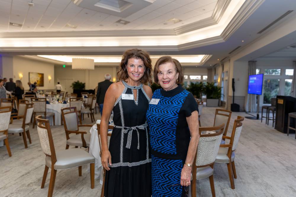 Pat Waring and Natalie Bernecker smiling and posing for photo